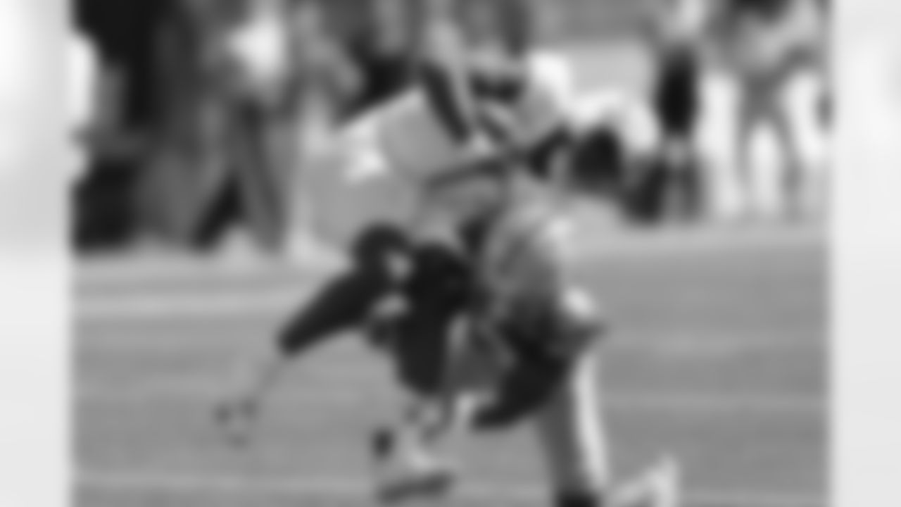 Marshalll QB Braylon Braxton (1) is upended by Ohio State's Caleb Downs (2) during the second half of an NCAA football game on Saturday, Sept. 21, 2024, in Columbus, Ohio. (AP Photo/Gregory Payan)