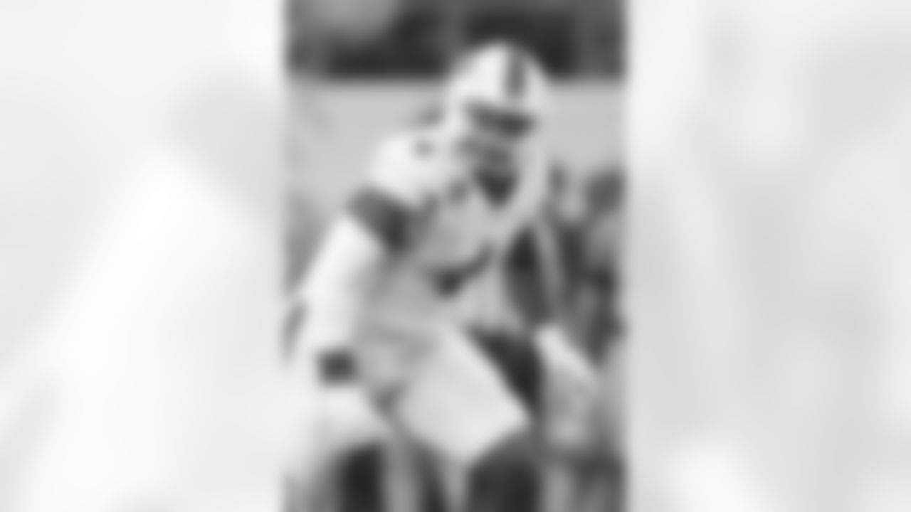 Miami defensive lineman Rueben Bain Jr. rushes in during the Cotton Bowl College Football Playoff quarterfinal game between Ohio State and Miami Wednesday, Dec. 31, 2025, in Arlington, Texas. (AP Photo/Julio Cortez)