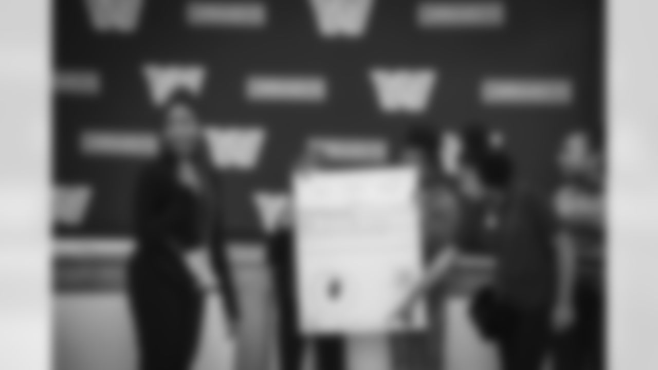 WASHINGTON, DC – DEC 09: Images of Johnson Johnson at his school visit at Malcolm X Elementary in Washington, DC on DECEMBER 09, 2025 (Photo by Taylor Sims for Washington Commanders)