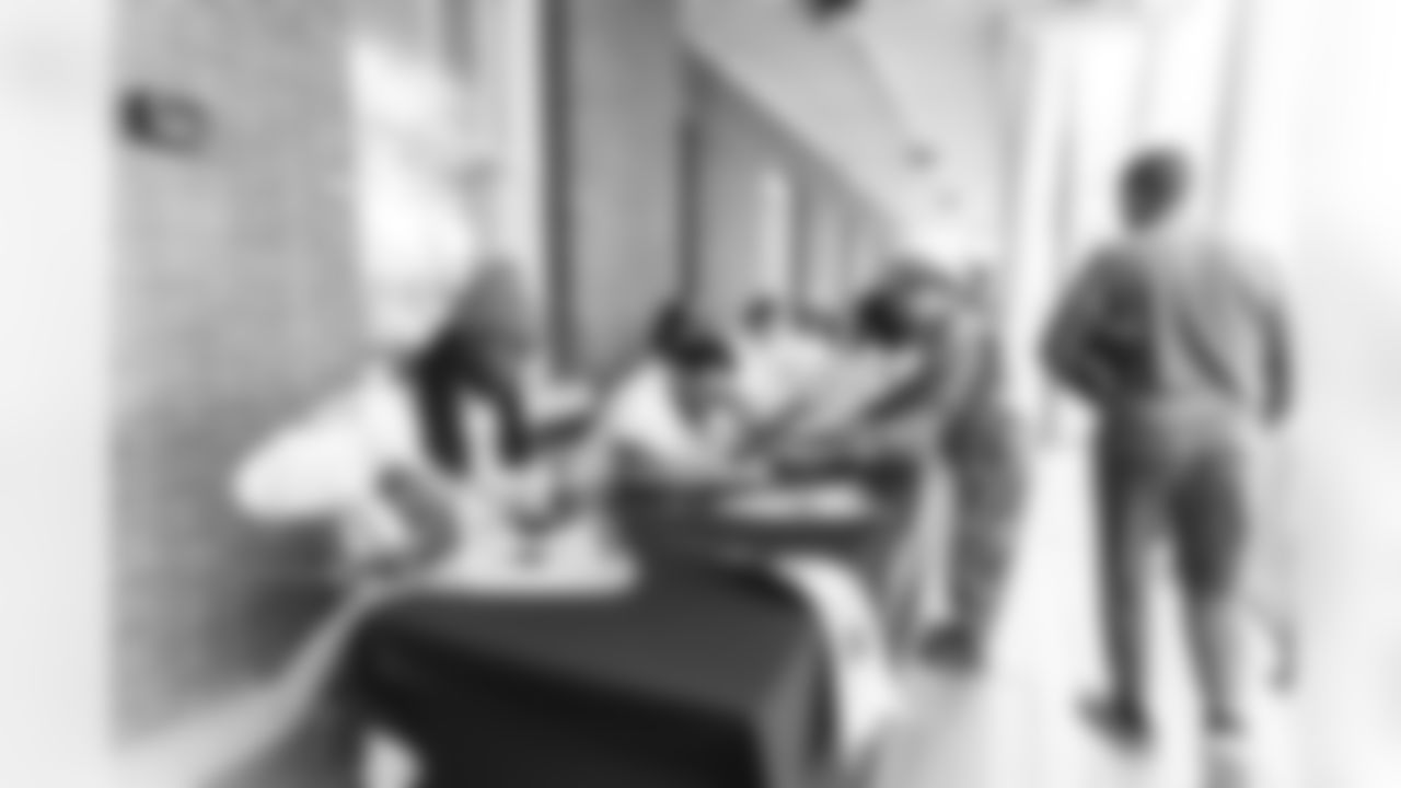 Images of Commander players and Command Force visiting Arlington National Cemetery with the USAA event staff at Fort Myers on October 21, 2025 in Landover, MD (Photo by Taylor Sims for Washington Commanders)