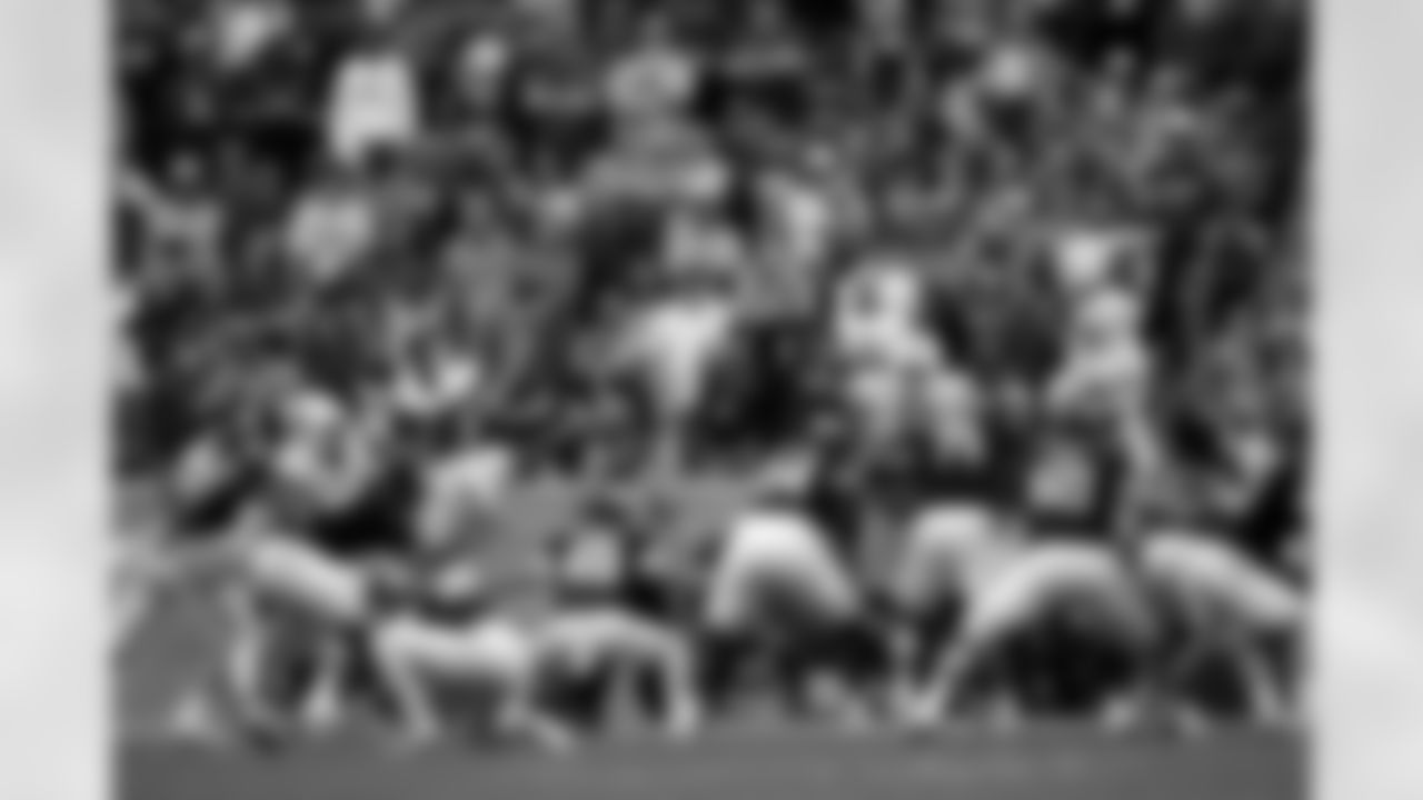 Miami defensive lineman Rueben Bain Jr. (4) blocks a field goal attemp by Texas A&M place kicker Jared Zirkel (99) during the second quarter in the first round of the NCAA College Football Playoff Saturday, Dec. 20, 2025, in College Station, Texas. (AP Photo/Sam Craft)