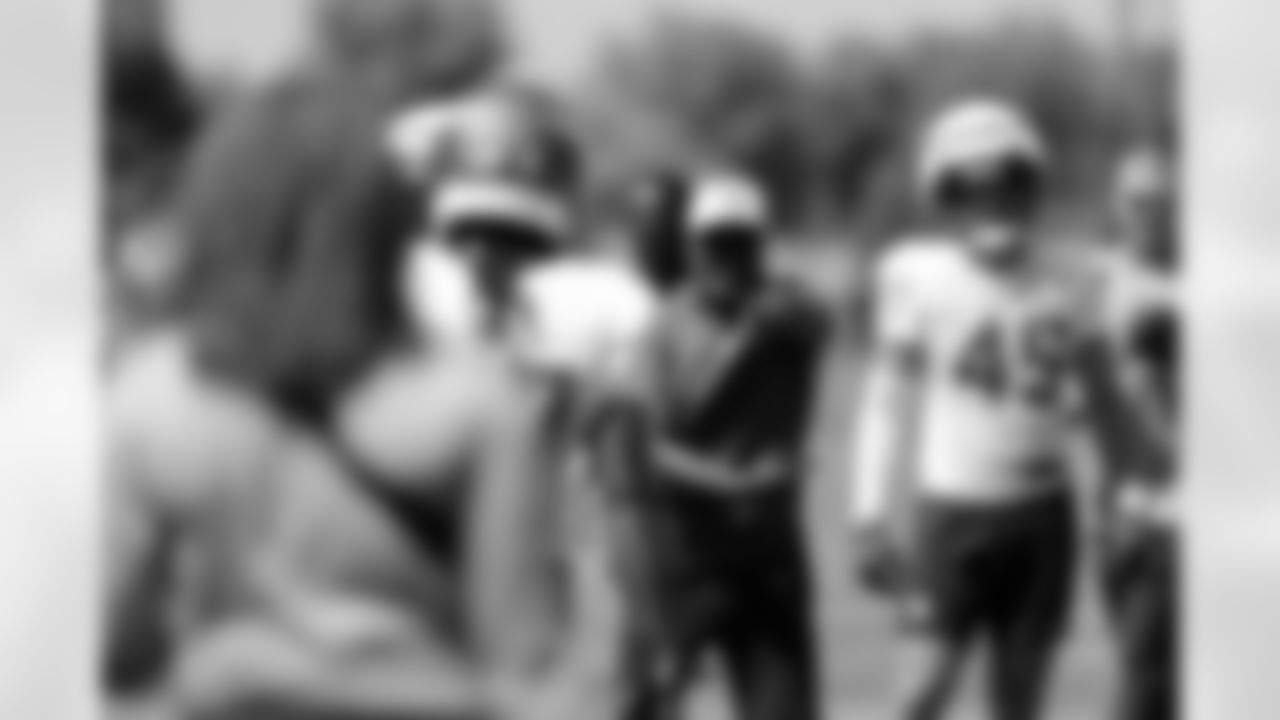 Minnesota Vikings defensive backs coach Daronte Jones instructs players during the team's NFL football training camp Saturday, July 26, 2025, in Eagan, Minn. (AP Photo/Bruce Kluckhohn)