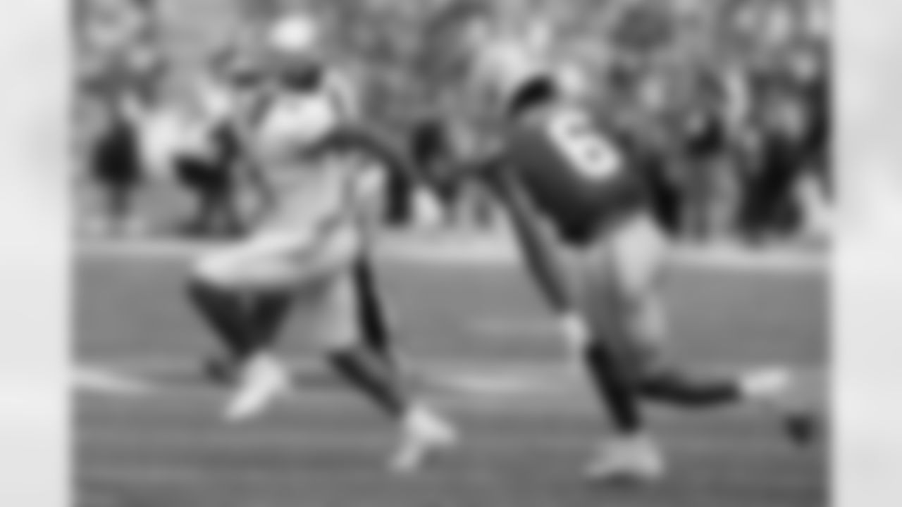 Youngstown State running back Dra Rushton, left, tries to run past Ohio State defensive back Sonny Styles during the second half of an NCAA college football game Saturday, Sept. 9, 2023, in Columbus, Ohio. (AP Photo/Jay LaPrete)