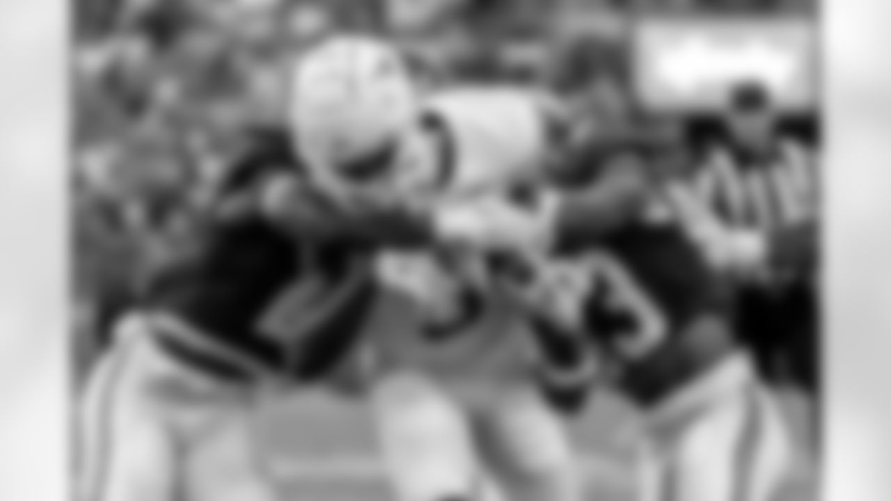 Texas wide receiver Adonai Mitchell (5) runs against Alabama defensive backs Caleb Downs (2) and Malachi Moore (13) during the first half of an NCAA college football game, Saturday, Sept. 9, 2023, in Tuscaloosa, Ala. (AP Photo/Vasha Hunt)