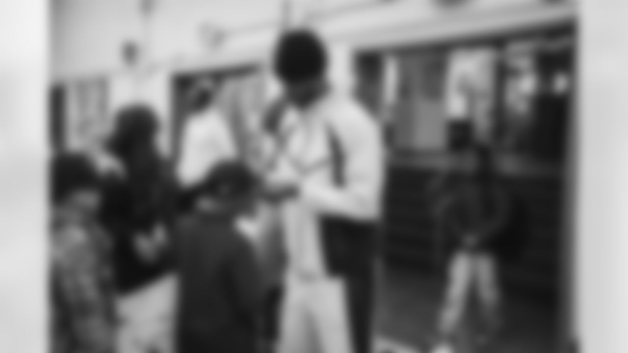 WASHINGTON, DC – DEC 09: Images of Johnson Johnson at his school visit at Malcolm X Elementary in Washington, DC on DECEMBER 09, 2025 (Photo by Taylor Sims for Washington Commanders)