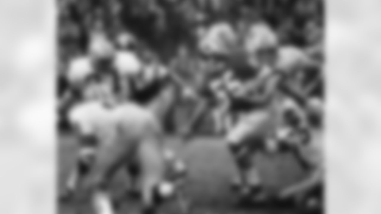 Washington Redskins linebacker Chris Hanburger (55) eludes Green Bay Packers running back McArthur Lane (36) on a 15-yard interception return during the 1972 NFC Divisional Playoff Game in Washington, D.C., Dec. 24, 1972. The Redskins defeated the Packers 16- 3. (AP Photo/Vernon Biever)