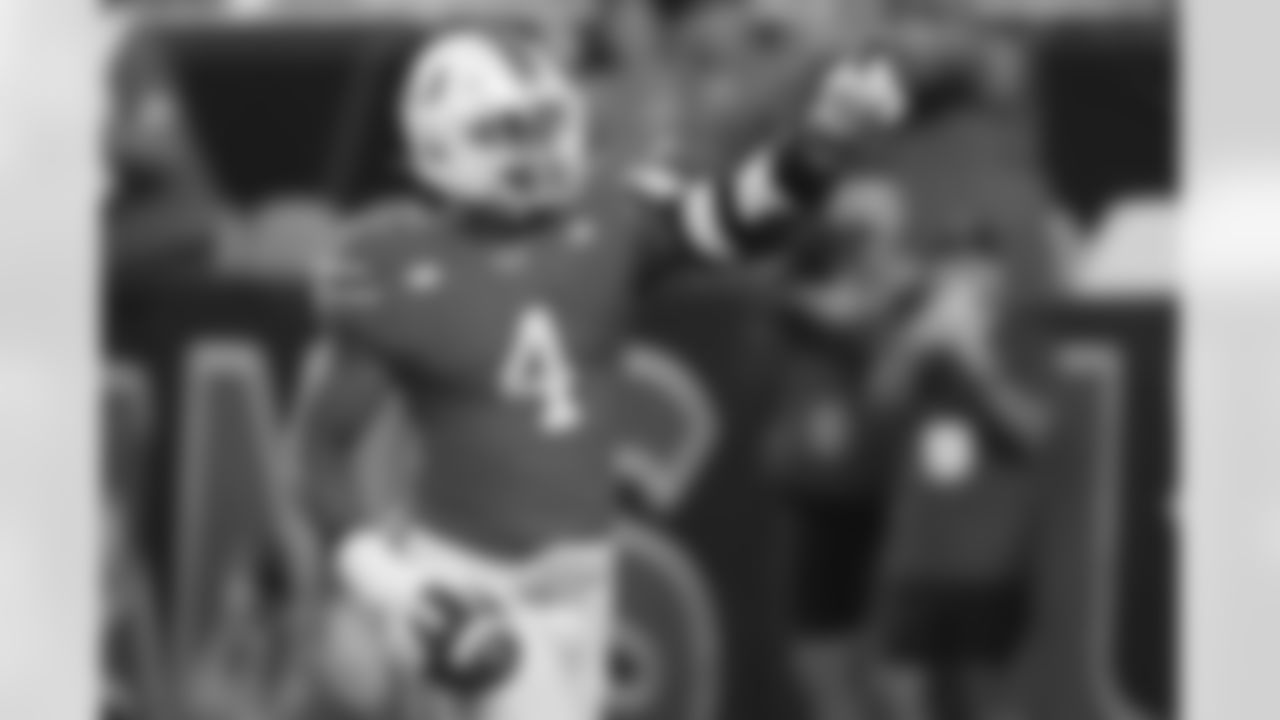 Miami defensive lineman Rueben Bain Jr. (4) reacts after intercepting a pass thrown by Notre Dame quarterback CJ Carr during the second half of an NCAA college football game, Sunday, Aug. 31, 2025, in Miami Gardens, Fla. (AP Photo/Lynne Sladky)