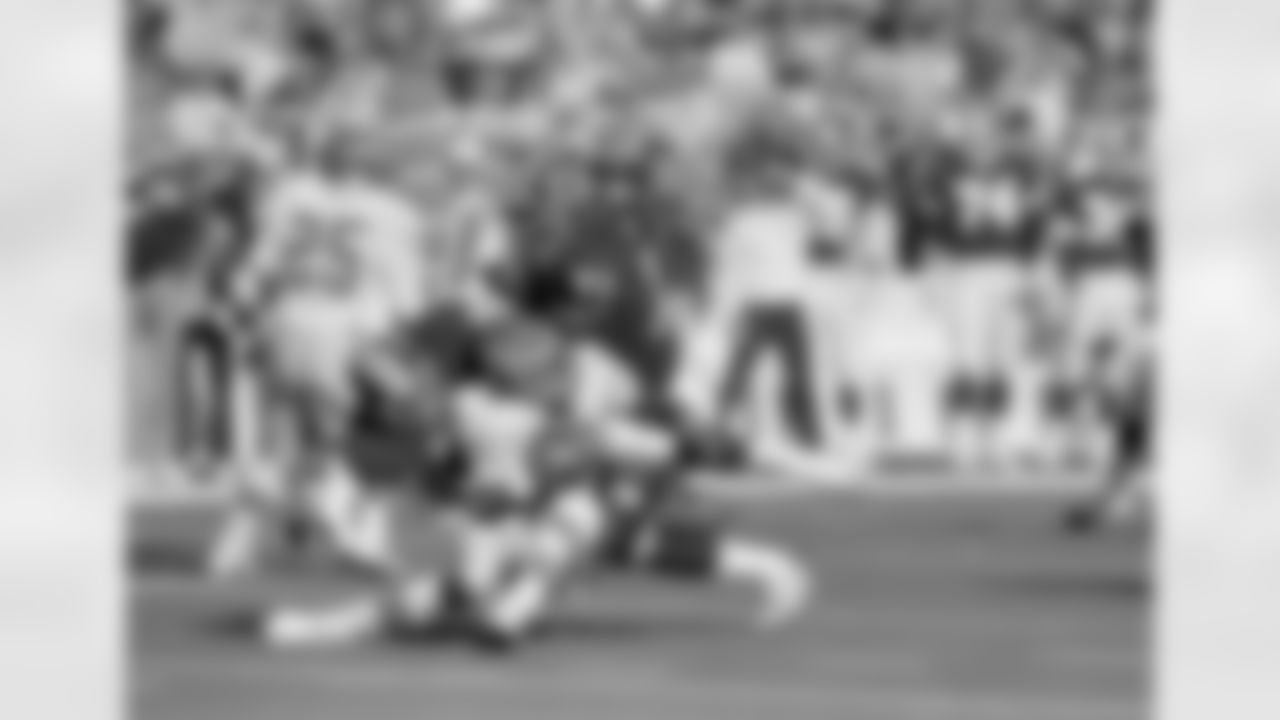 Washington Redskins Dexter Manley sacks Philadelphia Eagles Randall Cunningham for a loss of five yards in first quarter NFL action in their game at Philadelphia's Veterans Stadium, Nov. 13, 1989. Cunningham fumbled the ball and the Redskins recovered en route to a 10-3 win. (AP Photo/Rusty Kennedy)