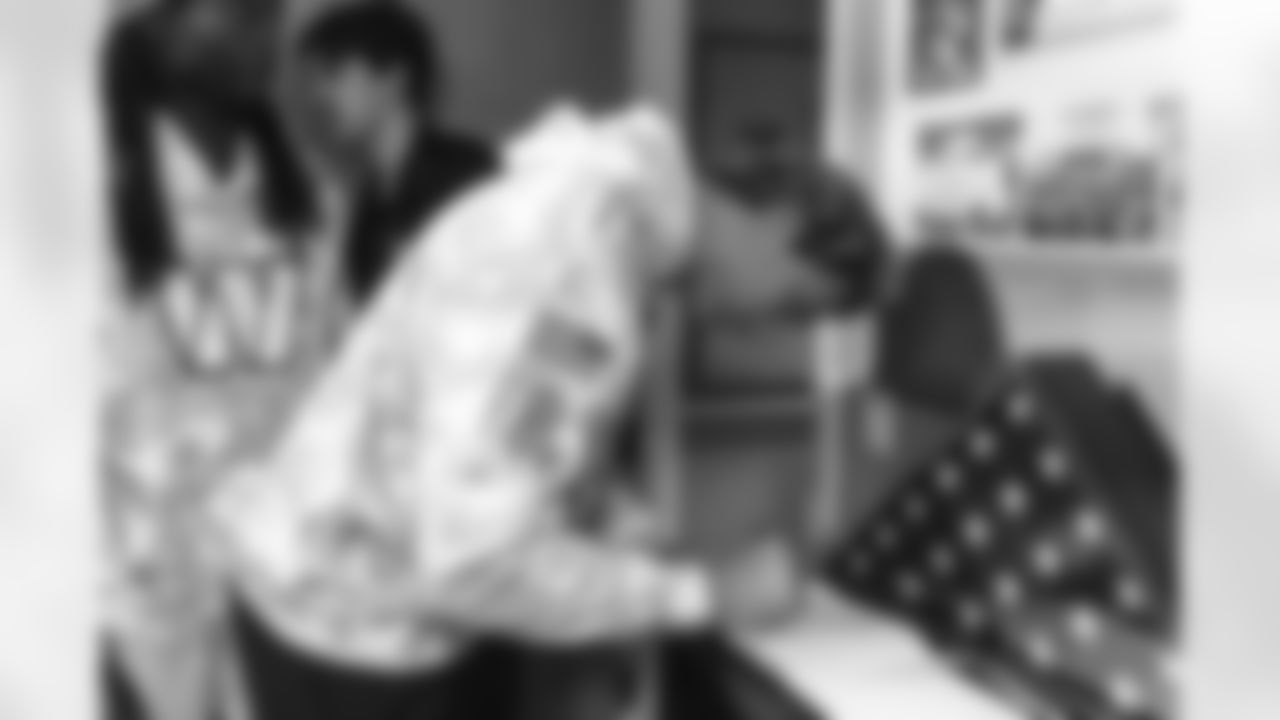 Images of Commander players and Command Force visiting Arlington National Cemetery with the USAA event staff at Fort Myers on October 21, 2025 in Landover, MD (Photo by Taylor Sims for Washington Commanders)