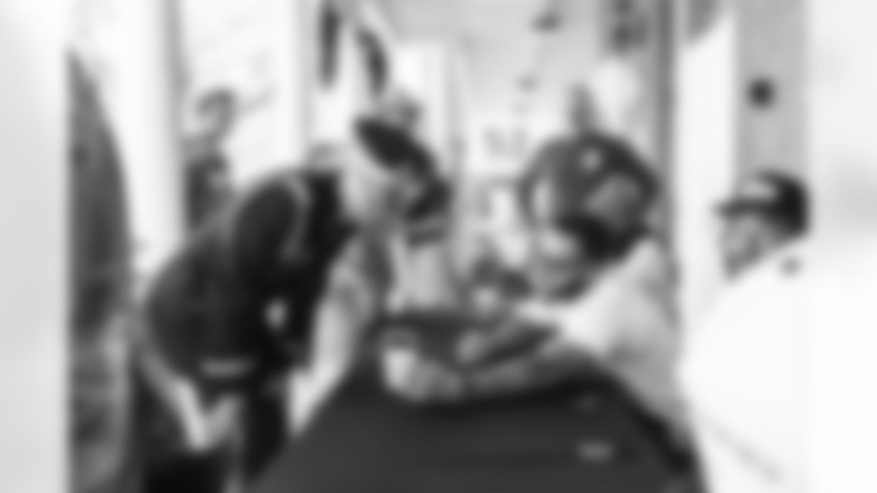 Images of Commander players and Command Force visiting Arlington National Cemetery with the USAA event staff at Fort Myers on October 21, 2025 in Landover, MD (Photo by Taylor Sims for Washington Commanders)