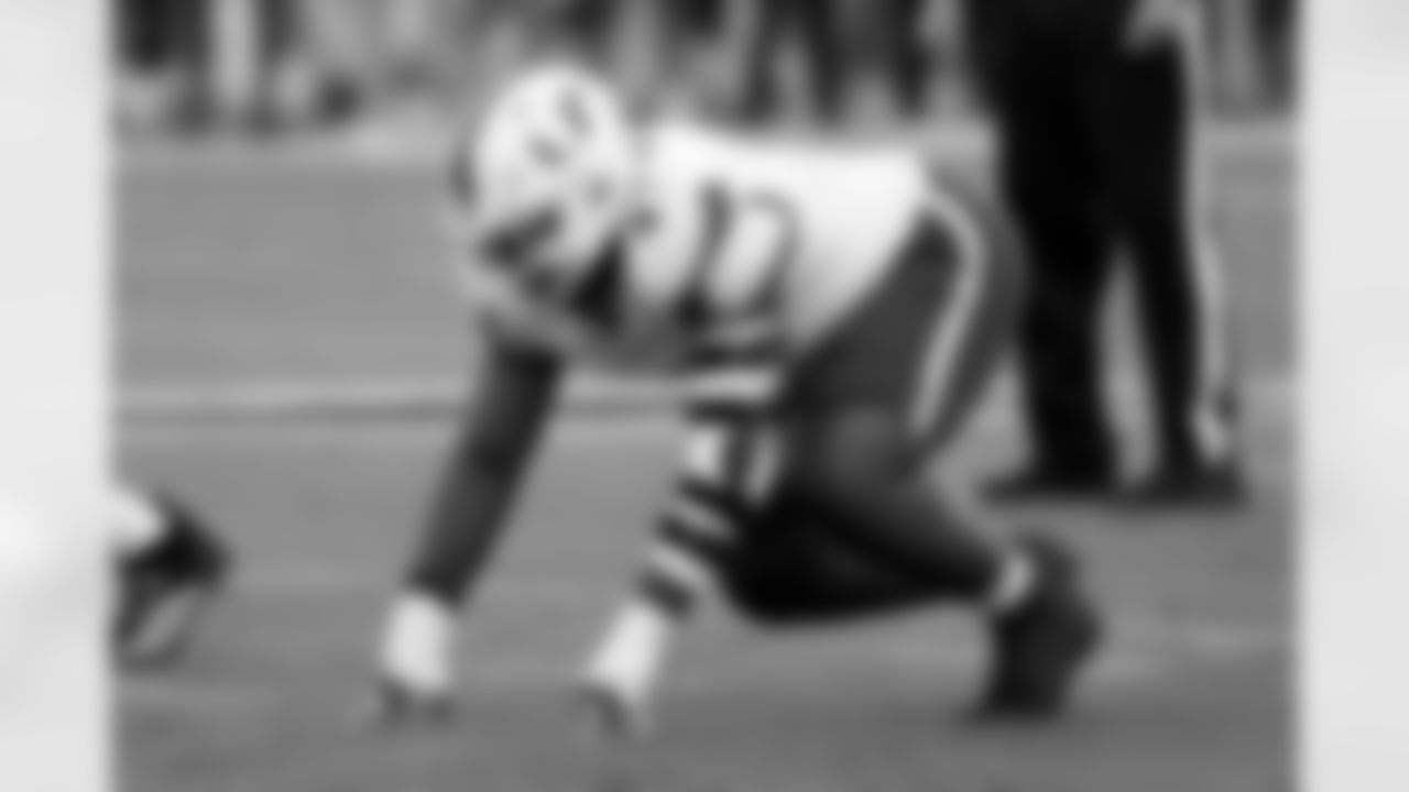 Miami defensive lineman Rueben Bain Jr. waits in a four point stance during an NCAA college football game against SMU, Saturday, Nov. 1, 2025, in Dallas. SMU won 26-20. (AP Photo/Jeffrey McWhorter)