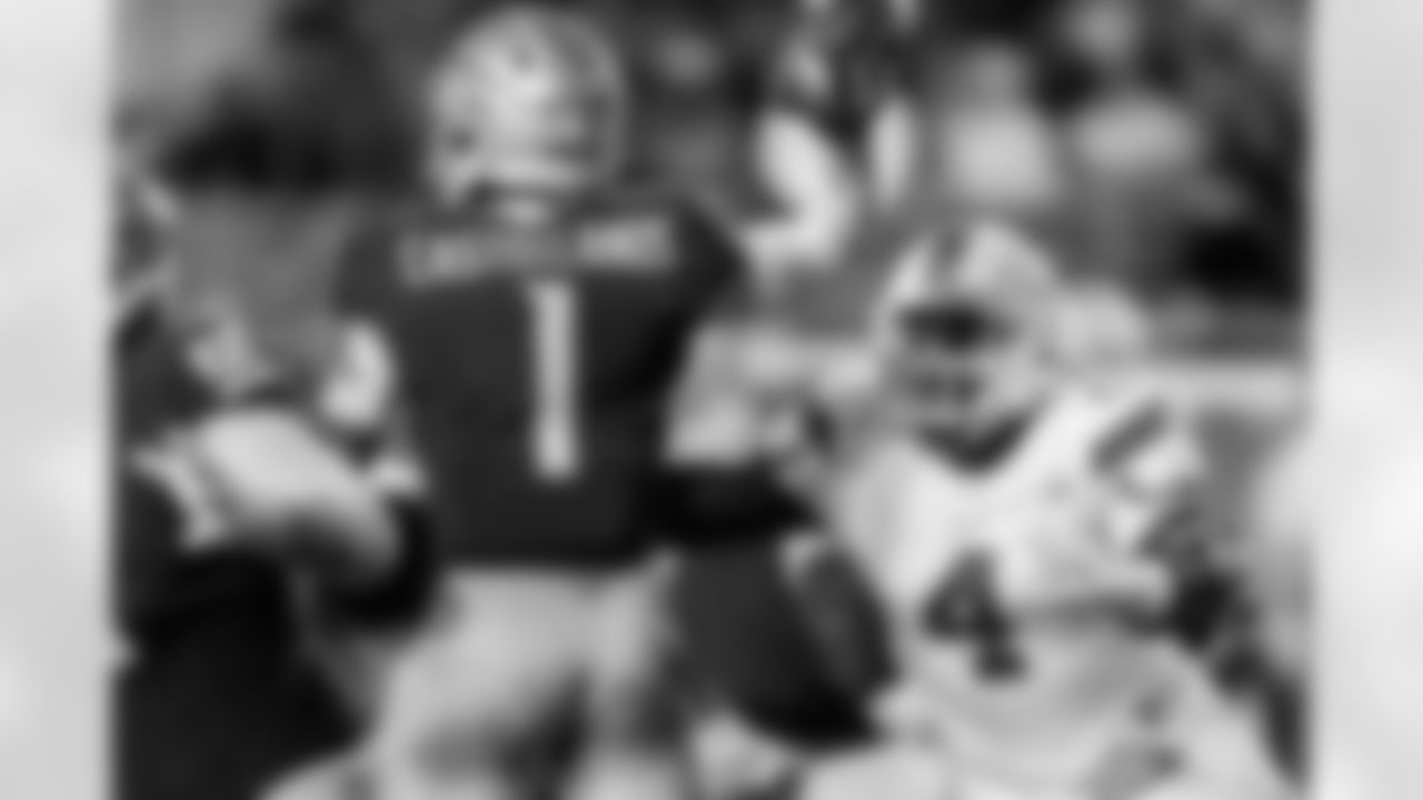 Miami defensive lineman Rueben Bain Jr. (4) pressures Florida State quarterback Tommy Castellanos (1) during the second half of an NCAA college football game, Saturday, Oct. 4, 2025, in Tallahassee, Fla. (AP Photo/Colin Hackley)