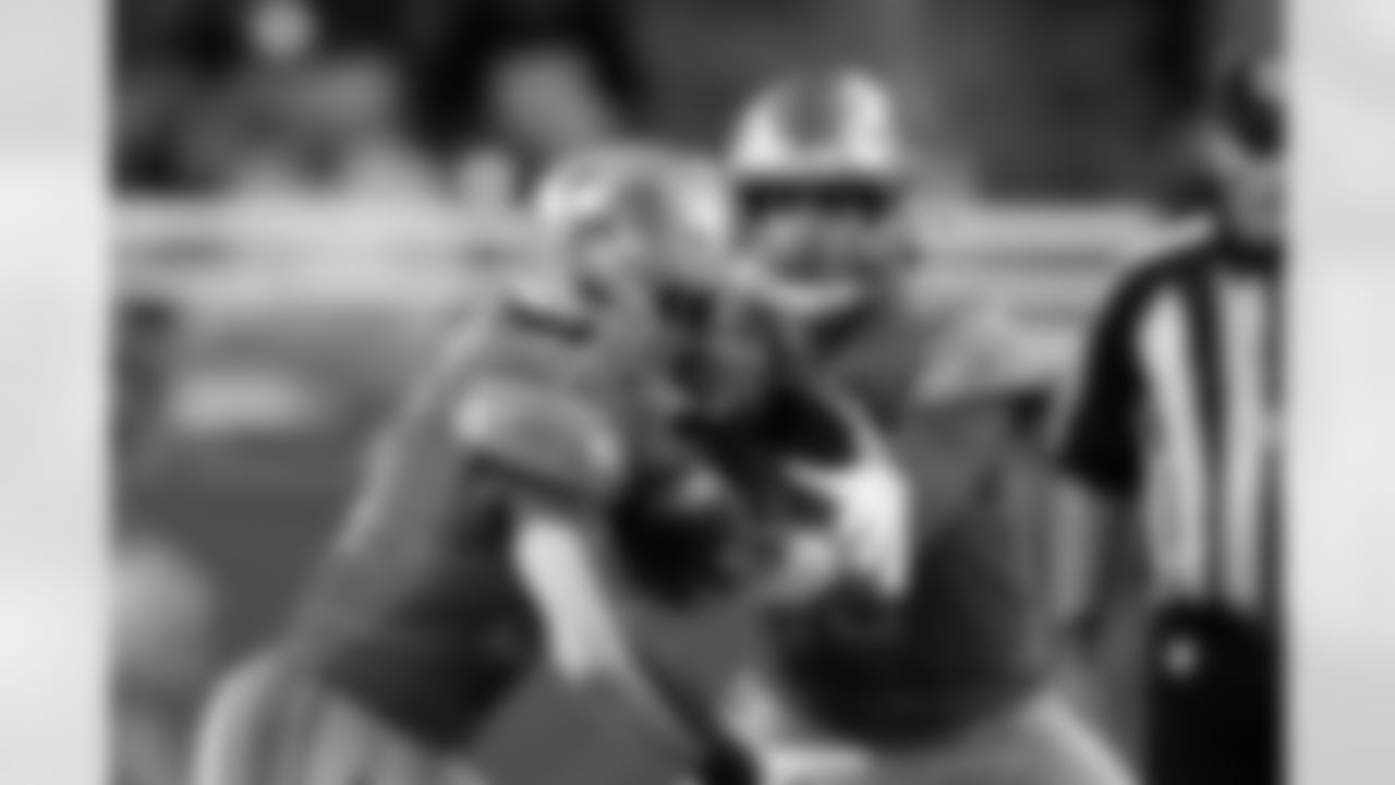 Detroit Lions quarterback David Blough hands off to running back Godwin Igwebuike during the first half of a preseason NFL football game against the Indianapolis Colts, Friday, Aug. 27, 2021, in Detroit. (AP Photo/Al Goldis)