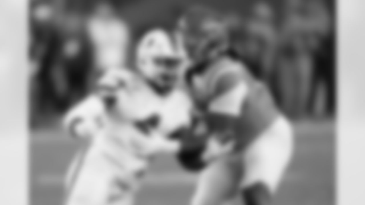 Miami defensive lineman Rueben Bain Jr., left, tries to get past Mississippi offensive lineman Diego Pounds, right, during the second half of the Fiesta Bowl NCAA college football playoff semifinal game, Thursday, Jan. 8, 2026, in Glendale, Ariz. (AP Photo/Ross D. Franklin)