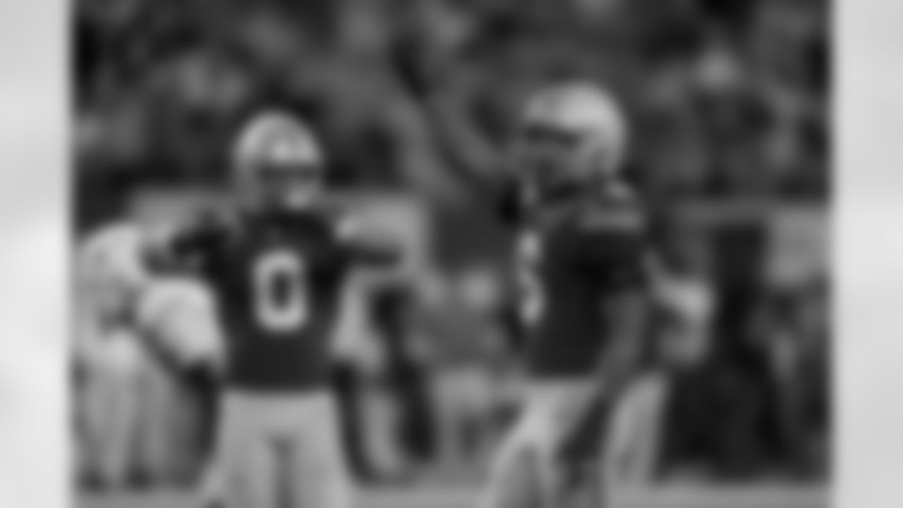 Ohio State safety Sonny Styles (6) and Ohio State linebacker Cody Simon (0) celebrate a defensive stop during the Cotton Bowl College Football Playoff semifinal game against Texas, Friday, Jan. 10, 2025, in Arlington, Texas. (AP Photo/Gareth Patterson)