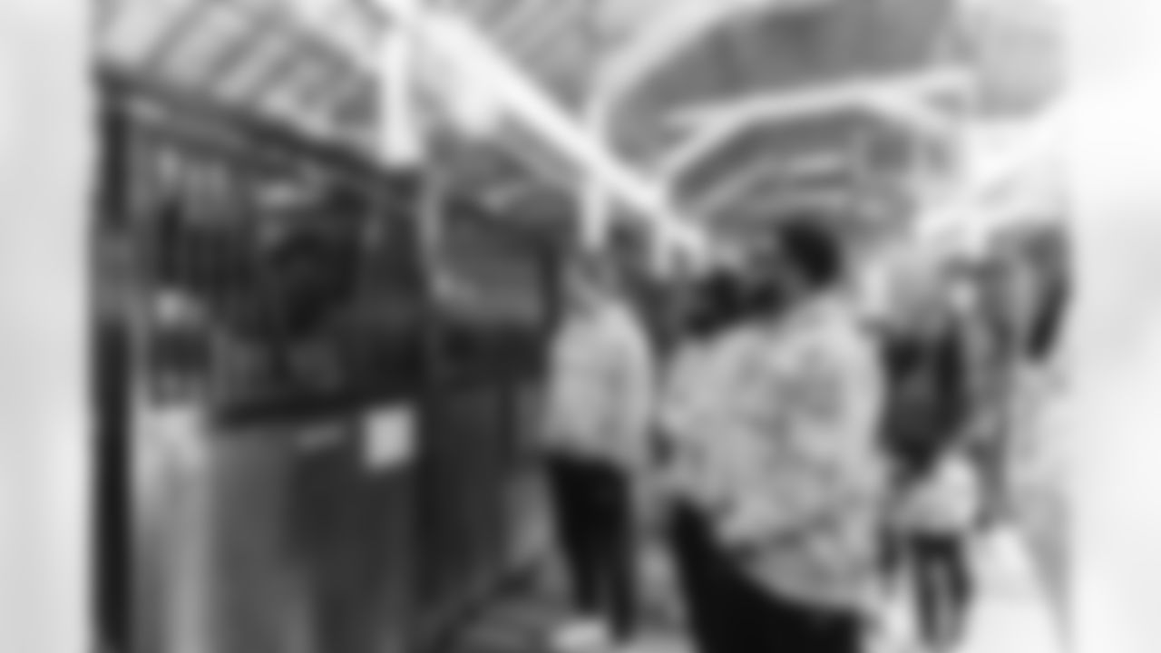 Images of Commander players and Command Force visiting Arlington National Cemetery with the USAA event staff at Fort Myers on October 21, 2025 in Landover, MD (Photo by Taylor Sims for Washington Commanders)