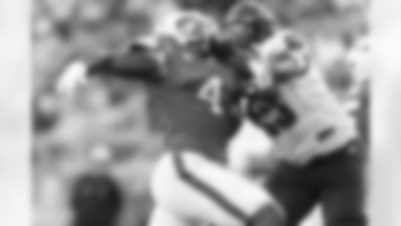 Miami defensive lineman Rueben Bain Jr. (4) defends North Carolina State offensive tackle Jacarrius Peak, right, during the first half of an NCAA college football game, Saturday, Nov. 15, 2025, in Miami Gardens, Fla. (AP Photo/Lynne Sladky)