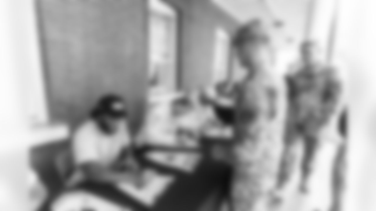 Images of Commander players and Command Force visiting Arlington National Cemetery with the USAA event staff at Fort Myers on October 21, 2025 in Landover, MD (Photo by Taylor Sims for Washington Commanders)