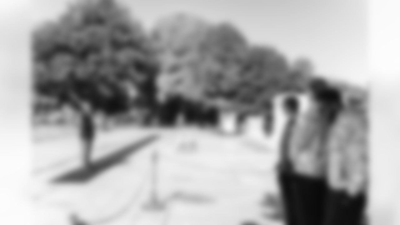 Images of Commander players and Command Force visiting Arlington National Cemetery with the USAA event staff at Fort Myers on October 21, 2025 in Landover, MD (Photo by Taylor Sims for Washington Commanders)