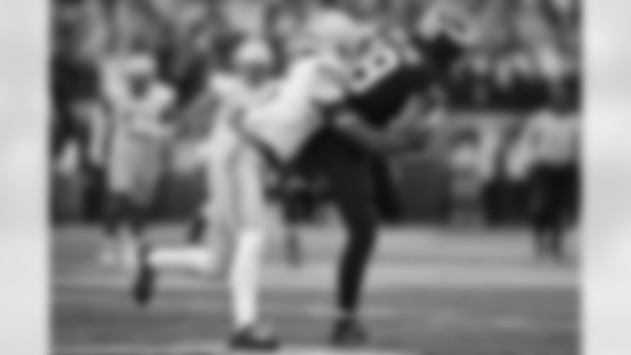 Michigan tight end Colston Loveland is tackled by Ohio State safety Sonny Styles during the second half of an NCAA college football game, Saturday, Nov. 25, 2023, in Ann Arbor, Mich. Michigan won 30-24. (AP Photo/David Dermer)