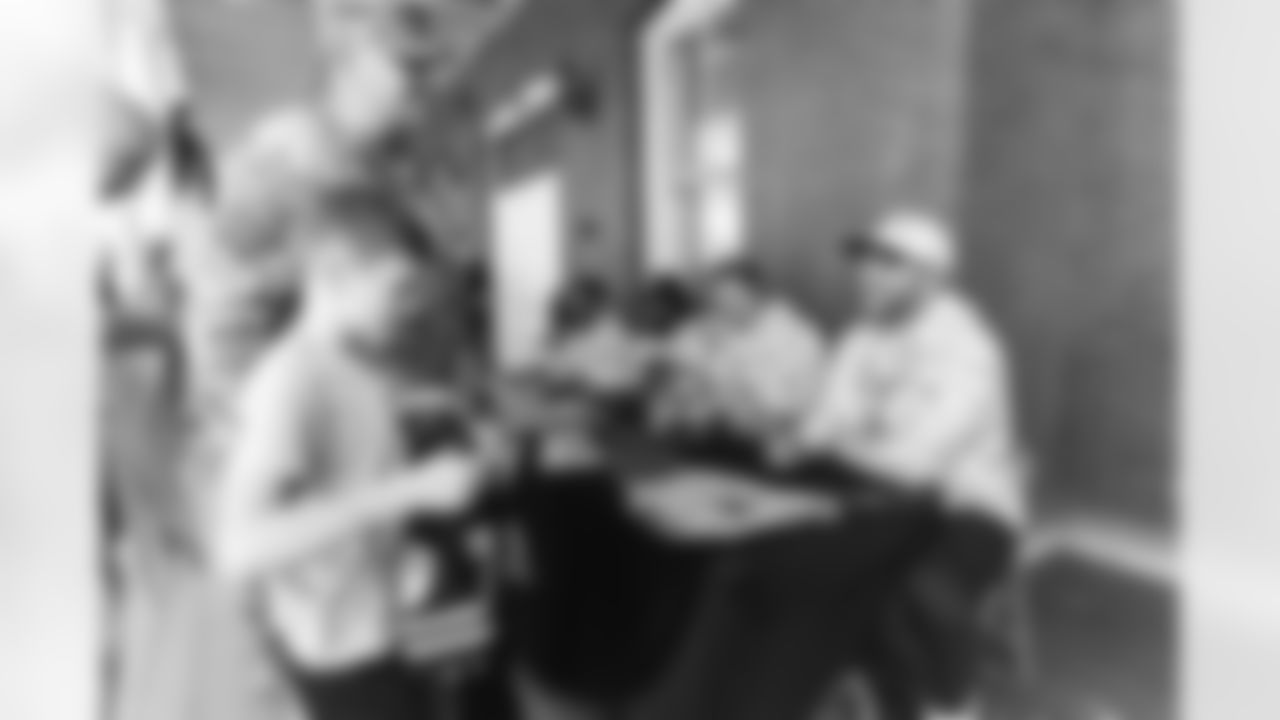 Images of Commander players and Command Force visiting Arlington National Cemetery with the USAA event staff at Fort Myers on October 21, 2025 in Landover, MD (Photo by Taylor Sims for Washington Commanders)