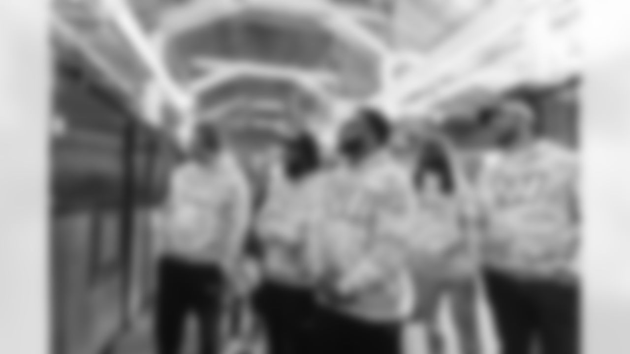 Images of Commander players and Command Force visiting Arlington National Cemetery with the USAA event staff at Fort Myers on October 21, 2025 in Landover, MD (Photo by Taylor Sims for Washington Commanders)