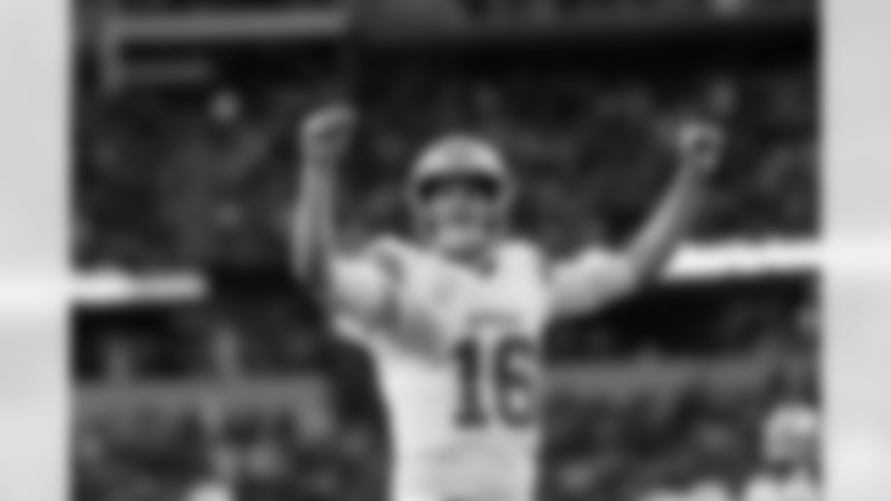 Detroit Lions quarterback Jared Goff (16) celebrates a touchdown during an NFL football game against the Dallas Cowboys on Sunday, Oct. 13, 2024, in Arlington, Texas. (AP Photo/Matt Patterson)