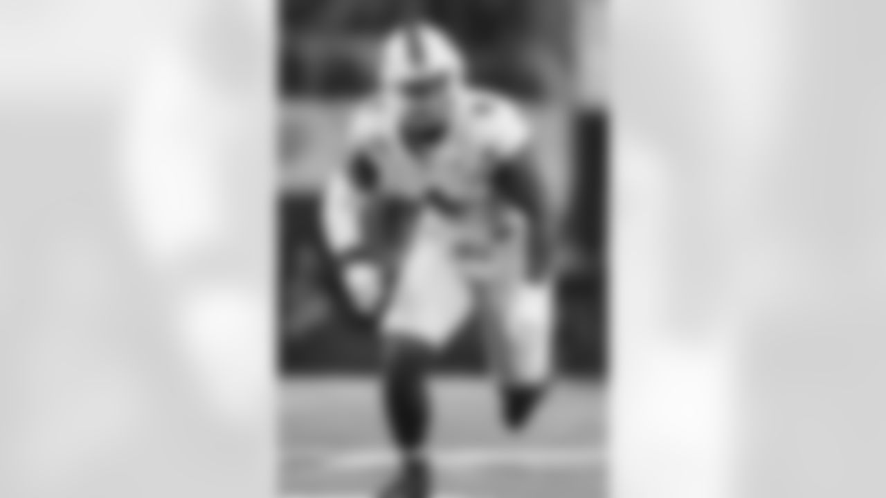 Miami defensive lineman Rueben Bain Jr. rushes in during the Cotton Bowl College Football Playoff quarterfinal game between Ohio State and Miami Wednesday, Dec. 31, 2025, in Arlington, Texas. (AP Photo/Julio Cortez)