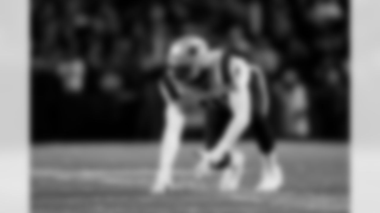 New England Patriots defensive end Deatrich Wise (91) runs around the edge during an NFL football game against the Buffalo Bills, Monday, Dec. 6, 2021, in Orchard Park, N.Y. The Patriots defeated the Bills, 14-10. (Ryan Kang via AP)