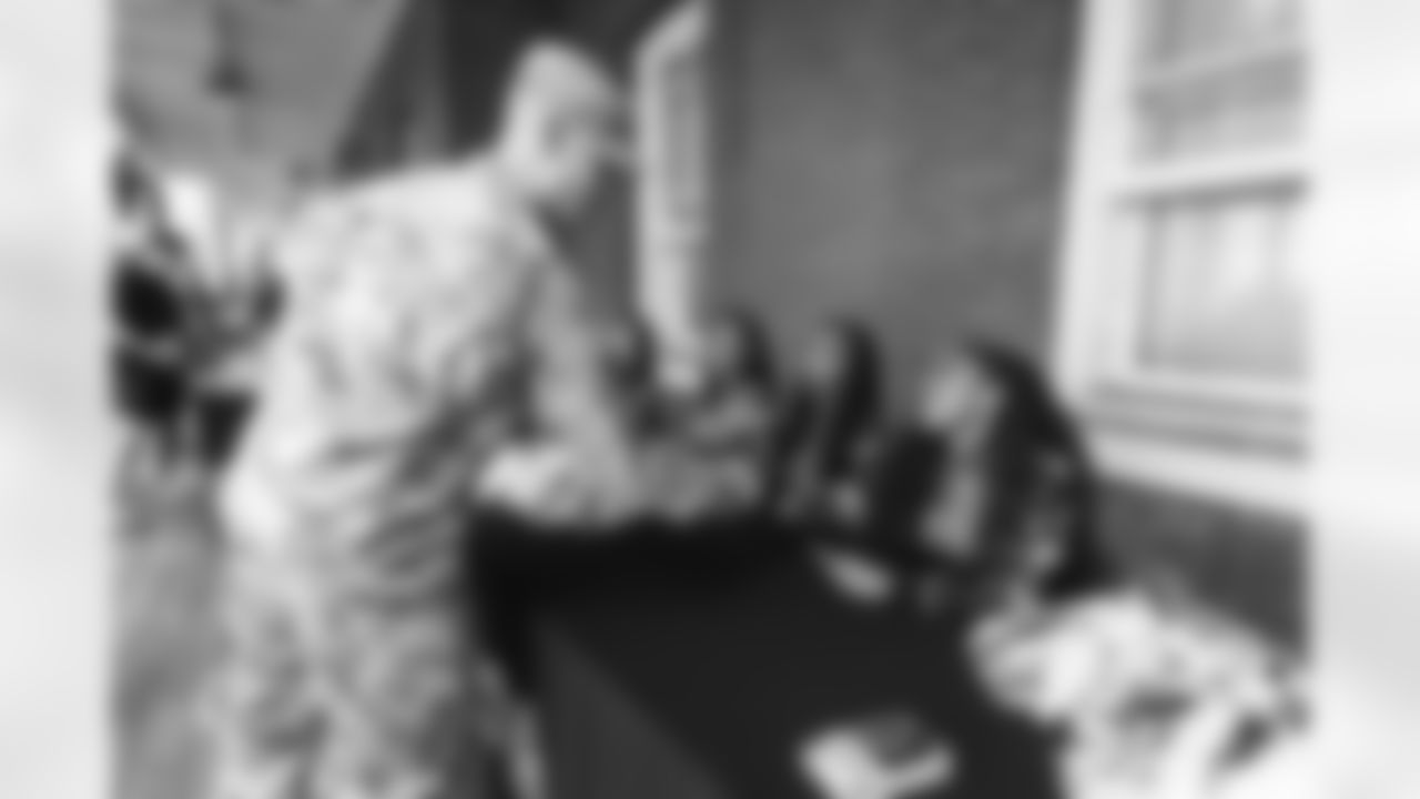 Images of Commander players and Command Force visiting Arlington National Cemetery with the USAA event staff at Fort Myers on October 21, 2025 in Landover, MD (Photo by Taylor Sims for Washington Commanders)