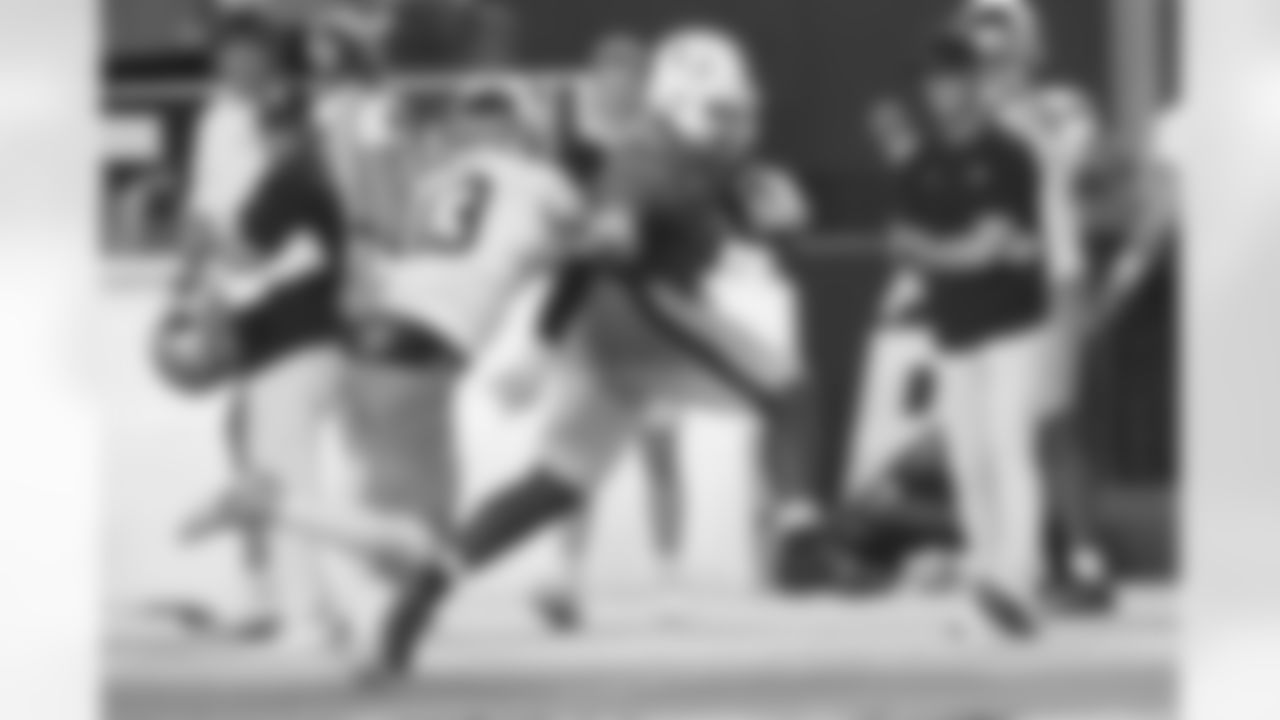 *Miami defensive lineman Rueben Bain Jr., right, runs after intercepting a pass thrown by Notre Dame quarterback CJ Carr (13) during the second half of an NCAA college football game, Sunday, Aug. 31, 2025, in Miami Gardens, Fla. (AP Photo/Lynne Sladky)