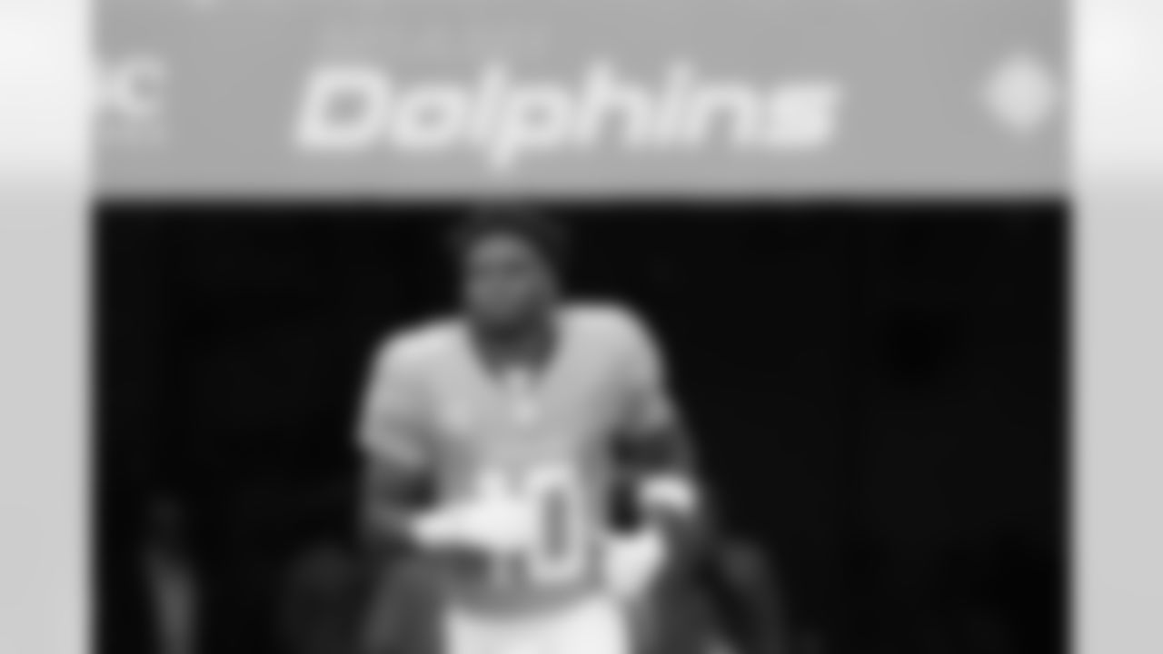 FILE - Miami Dolphins wide receiver Tyreek Hill (10) enters the field before an NFL football game against the San Francisco 49ers, Sunday, Dec. 22, 2024, in Miami Gardens, Fla. (AP Photo/Rebecca Blackwell, File)