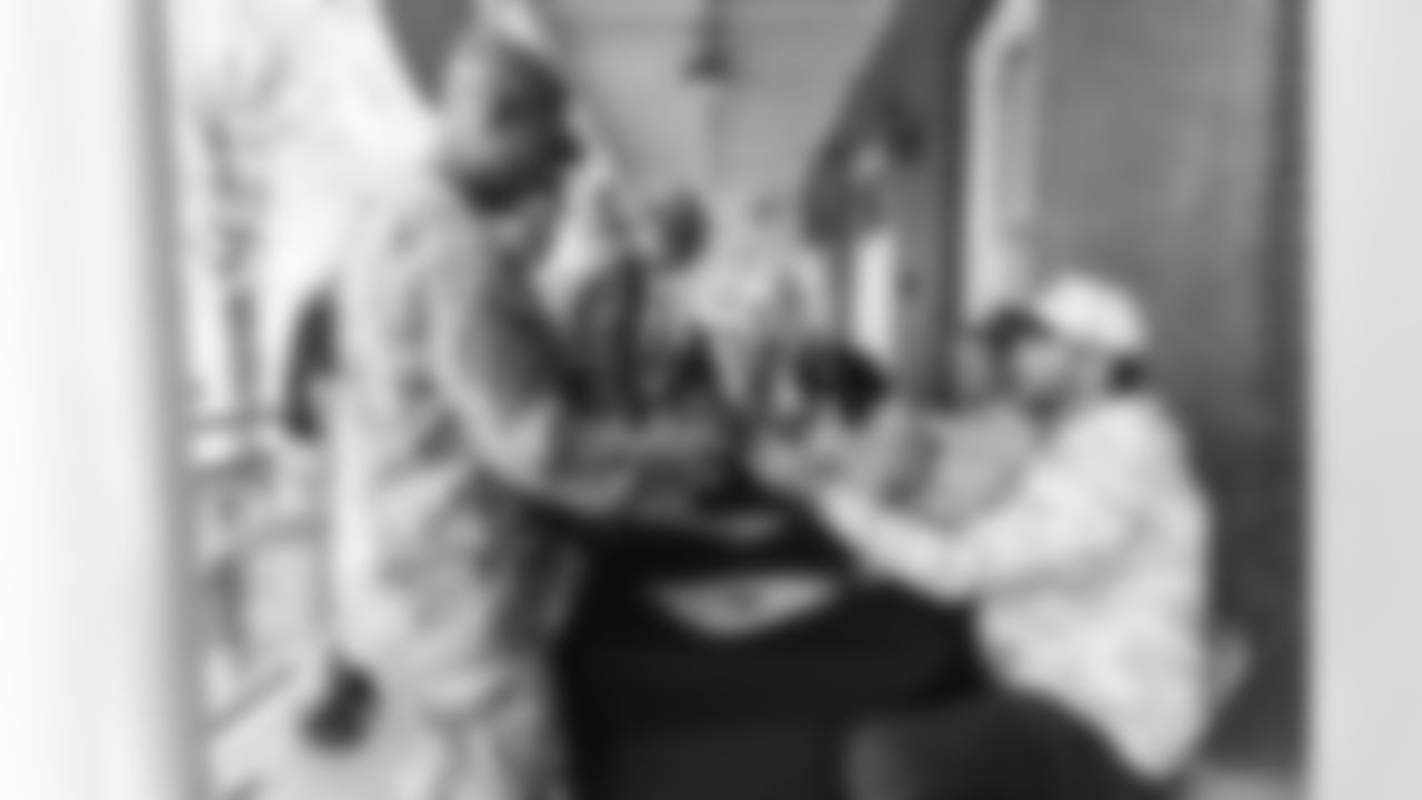 Images of Commander players and Command Force visiting Arlington National Cemetery with the USAA event staff at Fort Myers on October 21, 2025 in Landover, MD (Photo by Taylor Sims for Washington Commanders)