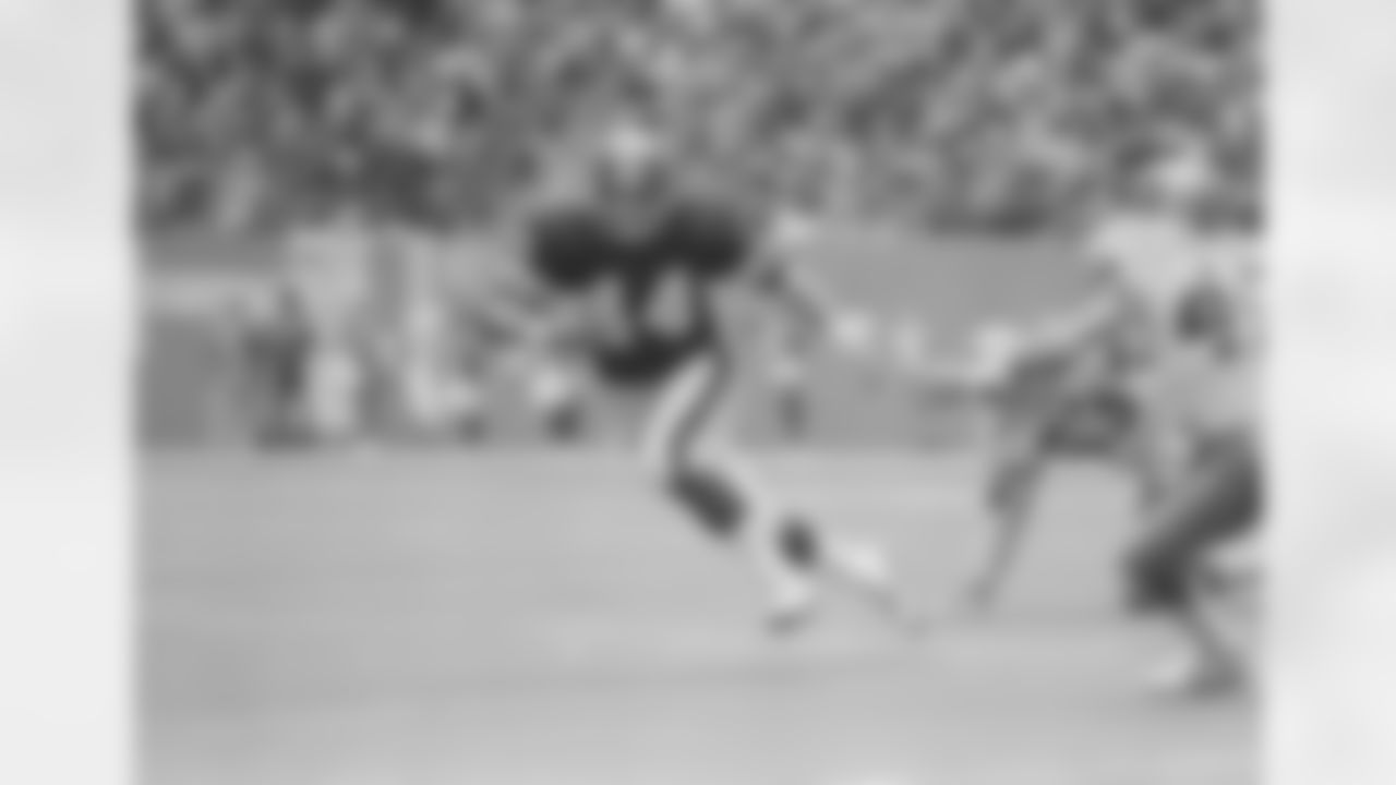 Washington Redskins' full back John Riggins (44) is slowed down near the Dallas goal line by Cowboys cornerback Benny Barnes, left, and linebacker Bob Breunig (53) during the frist quarter of game at Irving Texas Stadium, Dec. 16, 1979. (AP Photo)