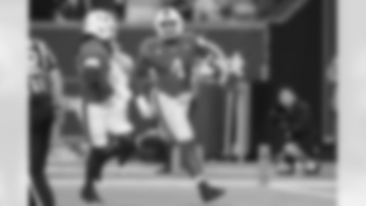 Miami defensive lineman Rueben Bain Jr. (4) reacts after intercepting a pass thrown by Notre Dame quarterback CJ Carr during the second half of an NCAA college football game, Sunday, Aug. 31, 2025, in Miami Gardens, Fla. (AP Photo/Lynne Sladky)