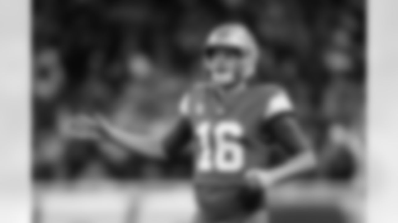 Detroit Lions quarterback Jared Goff (16) celebrates during an NFL football game against the Los Angeles Rams, Sunday, Sept. 8, 2024, in Detroit. The Lions defeated the Rams 26-20. (Cooper Neill via AP)