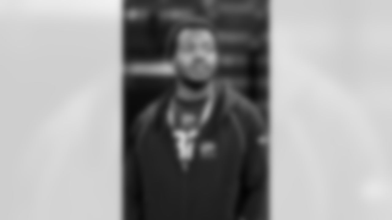 Miami defensive lineman Rueben Bain Jr. (32) watches participants at the NFL football scouting combine, Thursday, Feb. 26, 2026, in Indianapolis. (Gregory Payan/AP Content Services for NFL)