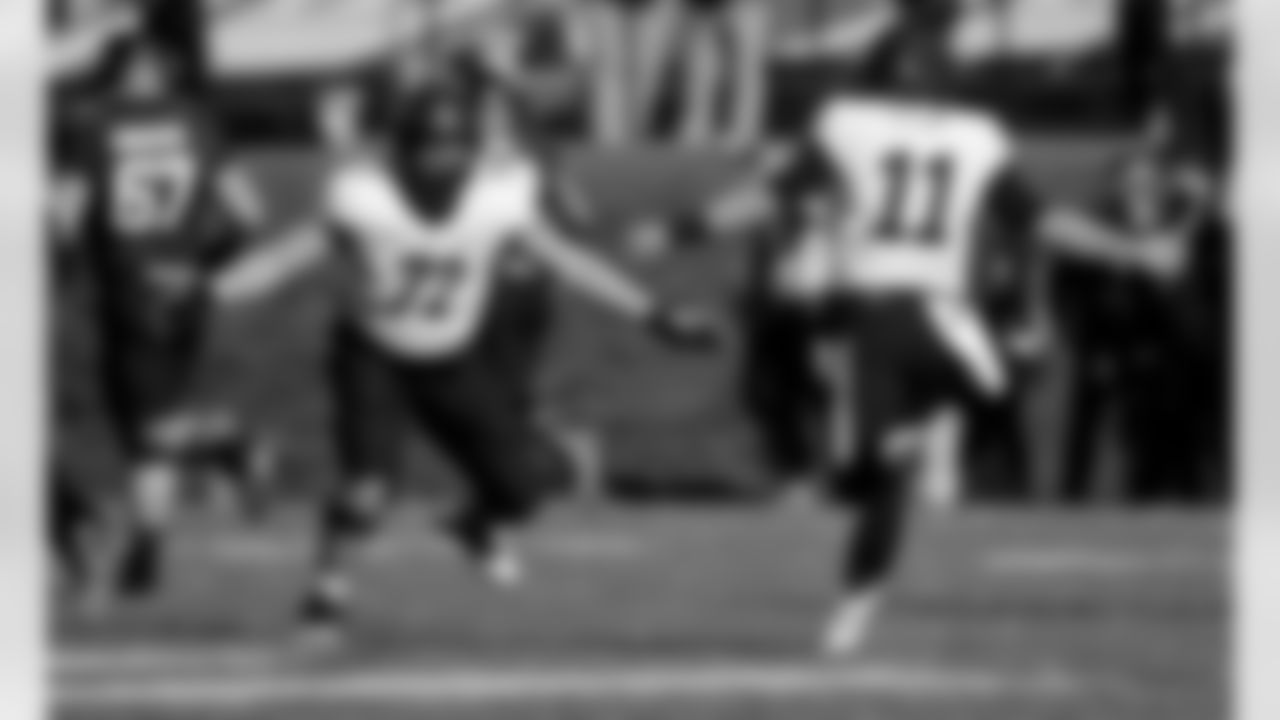 Purdue guard Jason King (72) and quarterback David Blough (11) celebrate a touchdown during the first half of an NCAA college football game against Northwestern in Evanston, Ill.,  Saturday, Nov. 14, 2015. (AP Photo/Matt Marton)