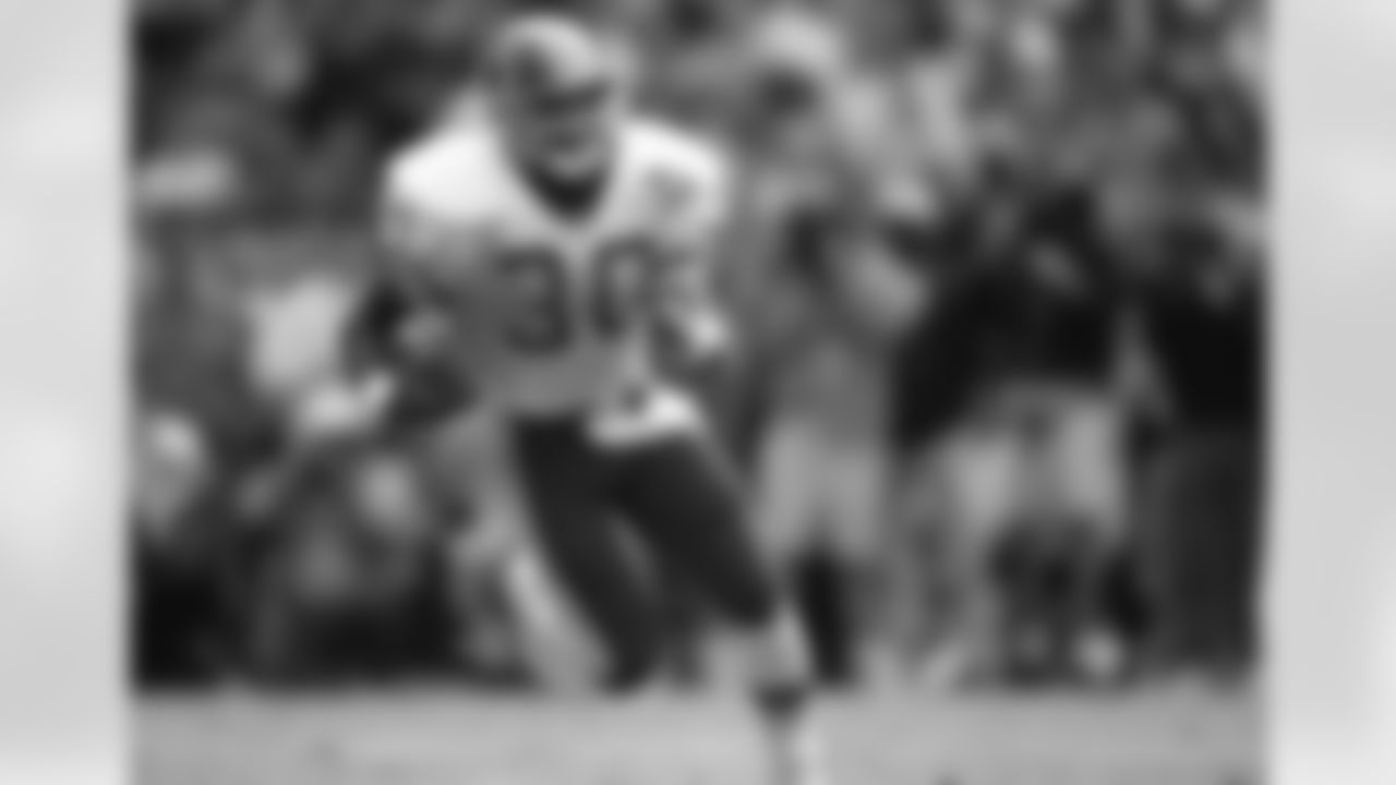 Washington Redskins running back Brian Mitchell (30) is seen in action during an NFL game against the Dallas Cowboys Oct. 2, 1994 in Washington, D.C.(Allen Kee via AP)