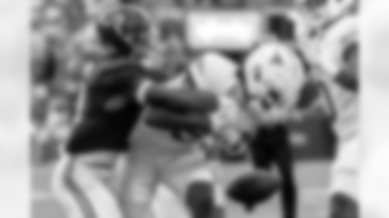 Alabama defensive back Caleb Downs (2) forces a fumble from Texas wide receiver Isaiah Neyor (9) during the first half of an NCAA college football game, Saturday, Sept. 9, 2023, in Tuscaloosa, Ala. (AP Photo/Vasha Hunt)