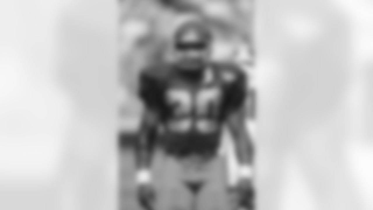 Washington Redskins running back Brian Mitchell (30) stands on the field before facing the Atlanta Falcons in Washington, DC, Sep. 25, 1994. The Falcons defeated the Redskins 27-20. (Paul Spinelli via AP)