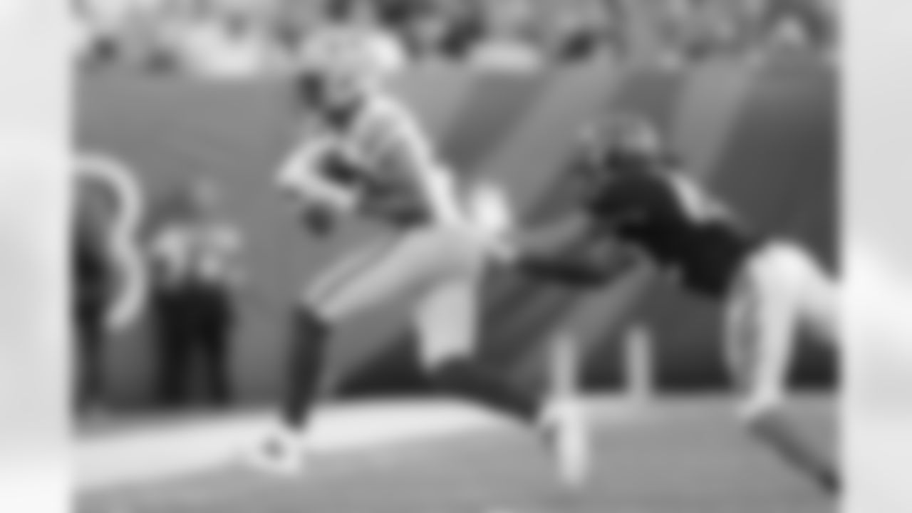 Green Bay Packers wide receiver Samori Toure (83) makes a catch against Cincinnati Bengals cornerback Allan George (42) during a preseason NFL game, Friday, Aug. 11, 2023, in Cincinnati. (Aaron Doster via AP)