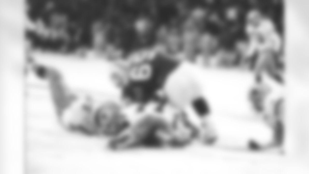 *13) In the infamous snow game played in Texas Stadium on Thanksgiving Day 1993, which defensive lineman botched a fumble recovery in the final seconds that allowed Miami to kick the winning field goal? *
With temperatures in the 20s and the field covered in snow and ice, Dallas appeared to have won the game when Dolphins kicker Pete Stoyanovich had his 41-yard field goal attempt blocked with 15 seconds left. But defensive tackle Leon Lett, who wasn't a regular on special teams, mistakenly thought the ball had to be recovered like a fumble. When he unfortunately touched it but failed to corral the prize, that indeed did make it a live ball, and the Dolphins promptly fell on it to retain possession. Stoyanovich then was good on a 19-yard field goal as time expired to give Miami a heartbreaking 16-14 victory. Not to worry, though, as the Cowboys never lost another game, winning eight straight on their way to capturing Super Bowl XXVIII.