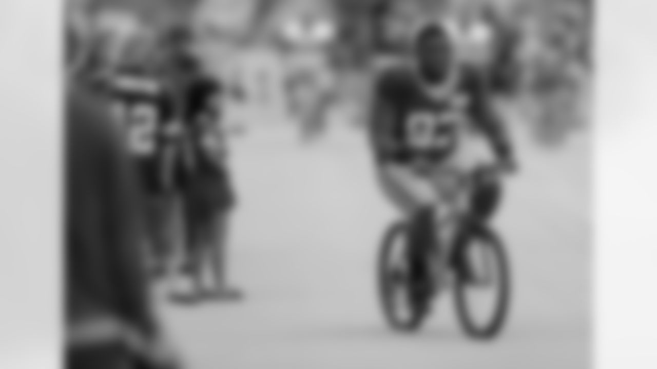 Kenny Clark, 27th overall, Green Bay, 2016
The Packers added Clark late in the first-round and he proved to be one of their best defensive players for nearly a decade.
Clark was the "other" player involved in the Micah Parsons trade, being sent to Dallas just before the start of the season.
In this pic, Clark is riding a bike before a training camp practice for the Packers, a tradition in Green Bay.