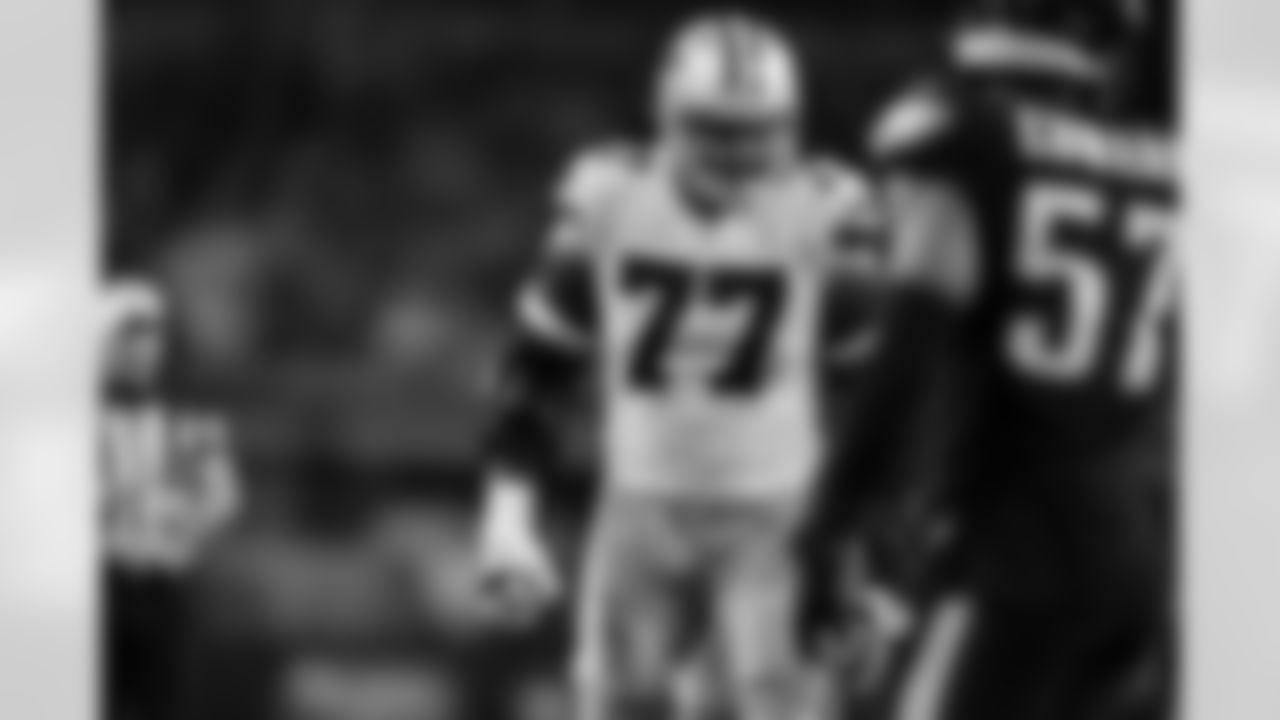 Dallas Cowboys offensive tackle Tyron Smith (77) gets set against the Philadelphia Eagles during an NFL football game, Saturday, Dec. 24, 2022, in Arlington, Texas. The Cowboys defeated the Eagles, 40-34. (Cooper Neill via AP)