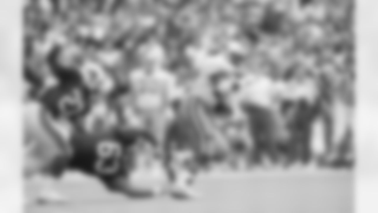 *19) In that 1993 win, what player had the longest play from scrimmage for his career, catching an 86-yard pass? * 
Emmitt Smith became the NFL's all-time leading rusher, but he could catch out of the backfield, too. Against the Cardinals, Smith caught a short dump-off pass from Kosar and turned it in an 86-yard gain to the 2-yard line.