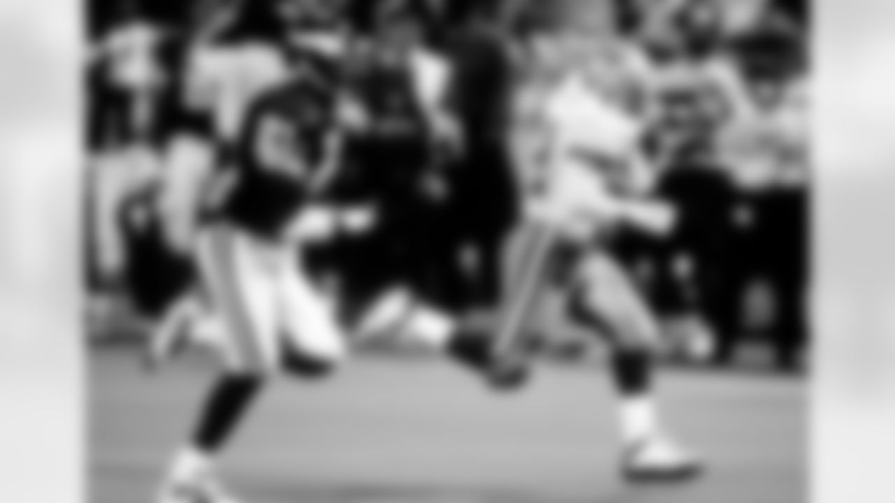 *15) Who scored the game-winning touchdown in the Cowboys' 23-17 overtime victory at Minnesota on Sept. 17, 1995? *
The sledding had been tough in the first half for Emmitt Smith in this Sunday night showdown as he rushed for just 27 yards on eight carries. His luck changed in the second half, though, when he broke loose for a 45-yard gain and then later scored a touchdown on a 2-yard run. Still, the Cowboys were forced into overtime when the Vikings tied things up with just 44 seconds left in regulation. But on the fifth snap of the extra frame, Smith darted off left guard and raced 31 yards to the end zone. With that, he finished with 150 rushing yards, marking the first time in his career he topped the century mark in the first three games of a season.