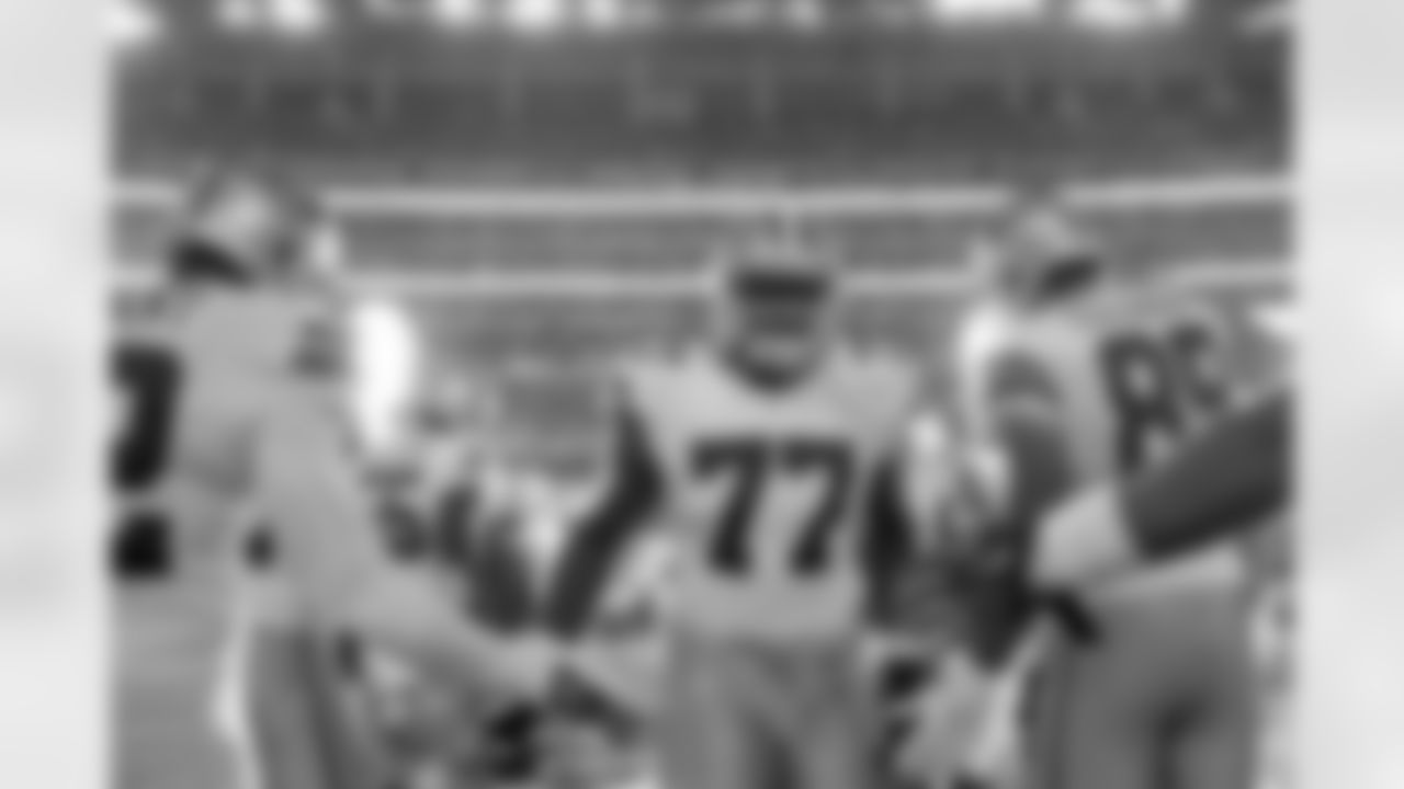 Dallas Cowboys offensive tackle Tyron Smith (77) is introduced before an NFL football game against the Washington Redskins on Monday, October 27, 2014 at AT&T Stadium in Arlington, Texas. The Redskins defeated the Cowboys in overtime, 20-17. (AP Photo/James D Smith)