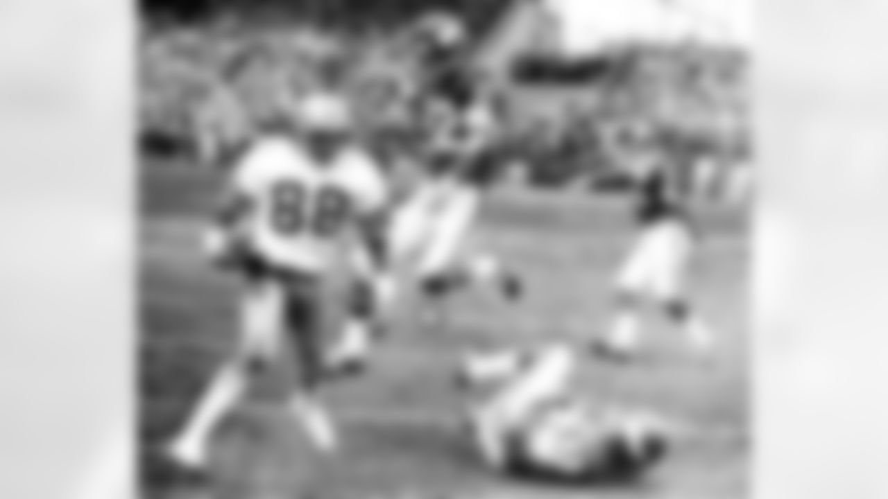 3) What strange event happened during the Cowboys' win at Minnesota in the divisional round of the 1975 playoffs?

This was the famed Hail Mary game at Minnesota that saw Roger Staubach connect with Drew Pearson on a 50-yard touchdown pass in the closing seconds to capture the upset victory. But during that play, a fan threw an orange (circled in red) onto the field that Pearson at first thought was a penalty flag. Shortly thereafter, another fan threw a whiskey bottle that hit official Armen Terzian in the head, knocking him out. As bad as that was, the weirdest event occurred two plays before the Hail Mary. Pearson had made a tip-toe catch along the sideline for the first down, but as he laid on the ground, a Vikings security guard ran up and gave him a quick kick in the leg. No matter, despite all the craziness, Dallas got the win, 17-14.