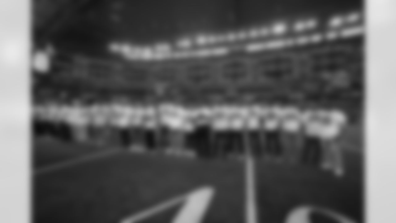 Dallas Cowboys alumni honored before the game Sunday.
